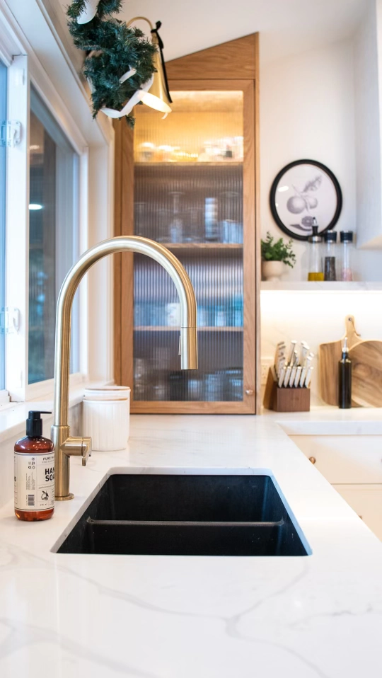 Warm kitchen detail with premium finishes at The White House