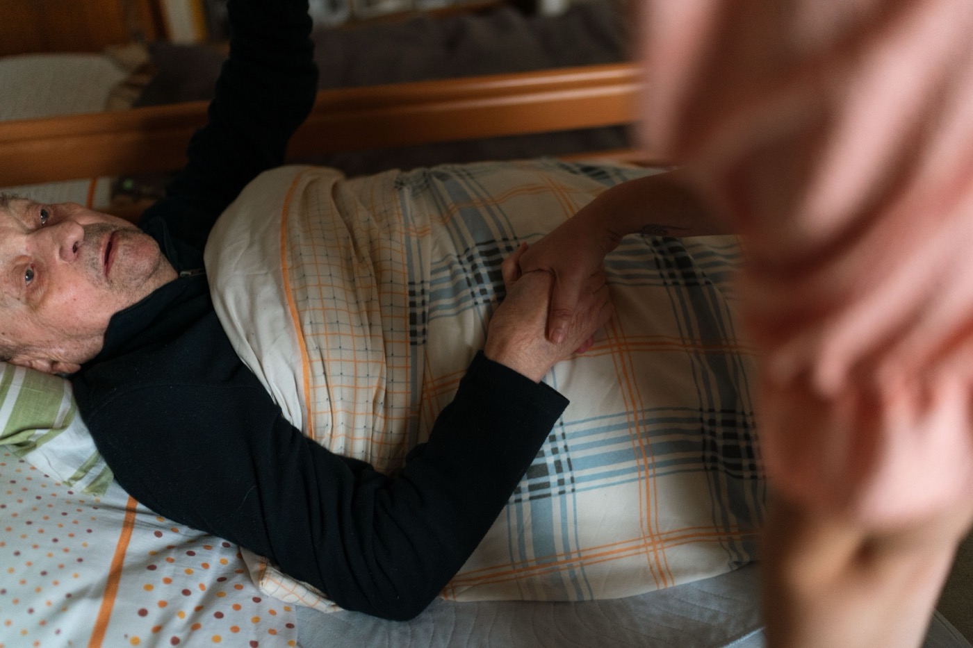 Care worker offering reassurance during a home visit
