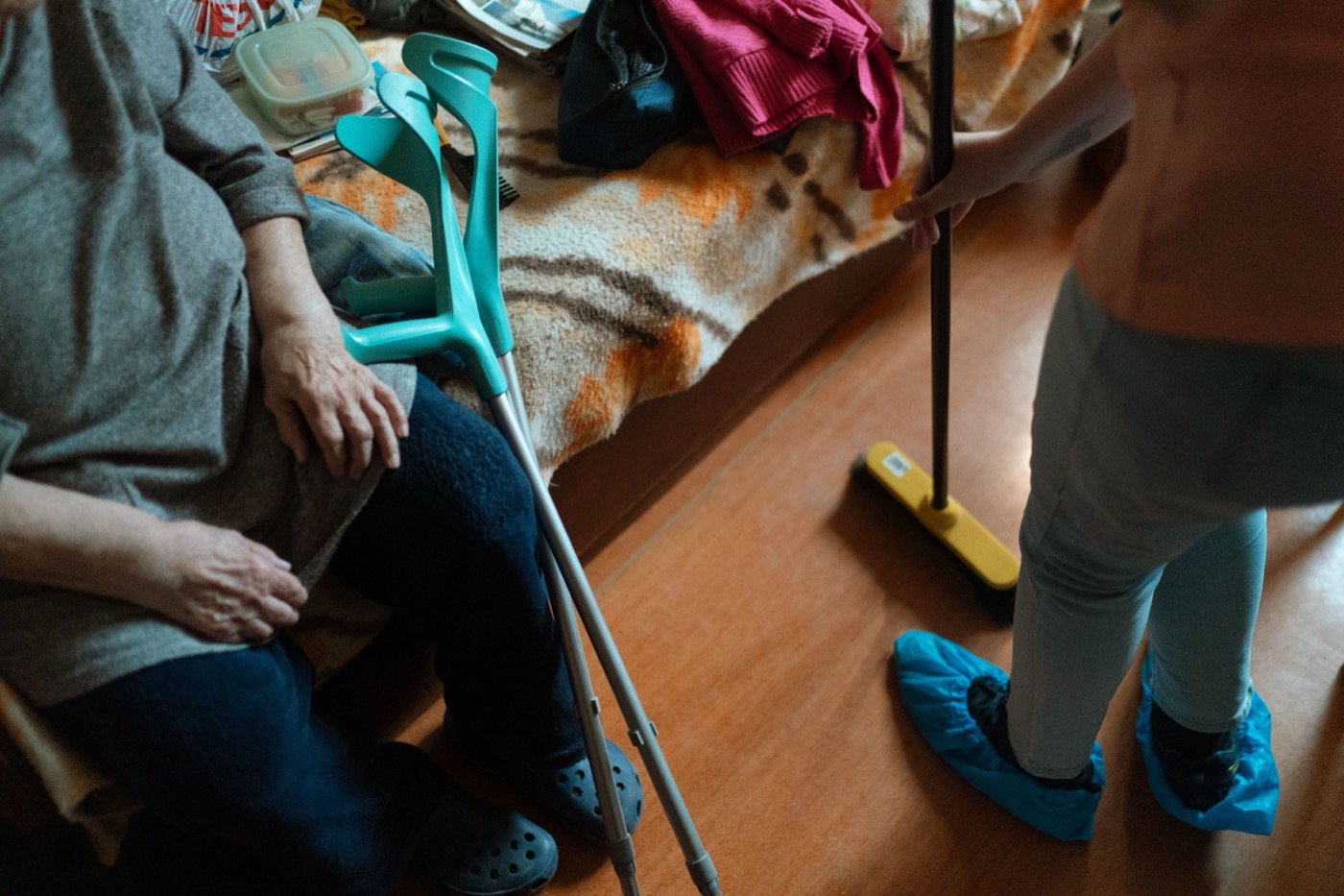Care worker helping with household support at home
