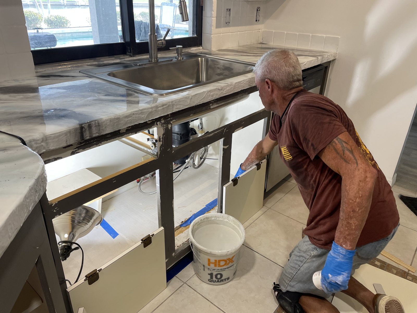 Trey finishing an epoxy countertop