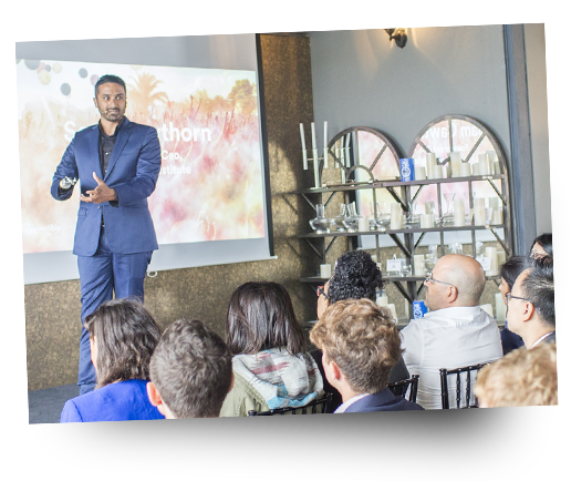 Sam Cawthorn presenting to an audience