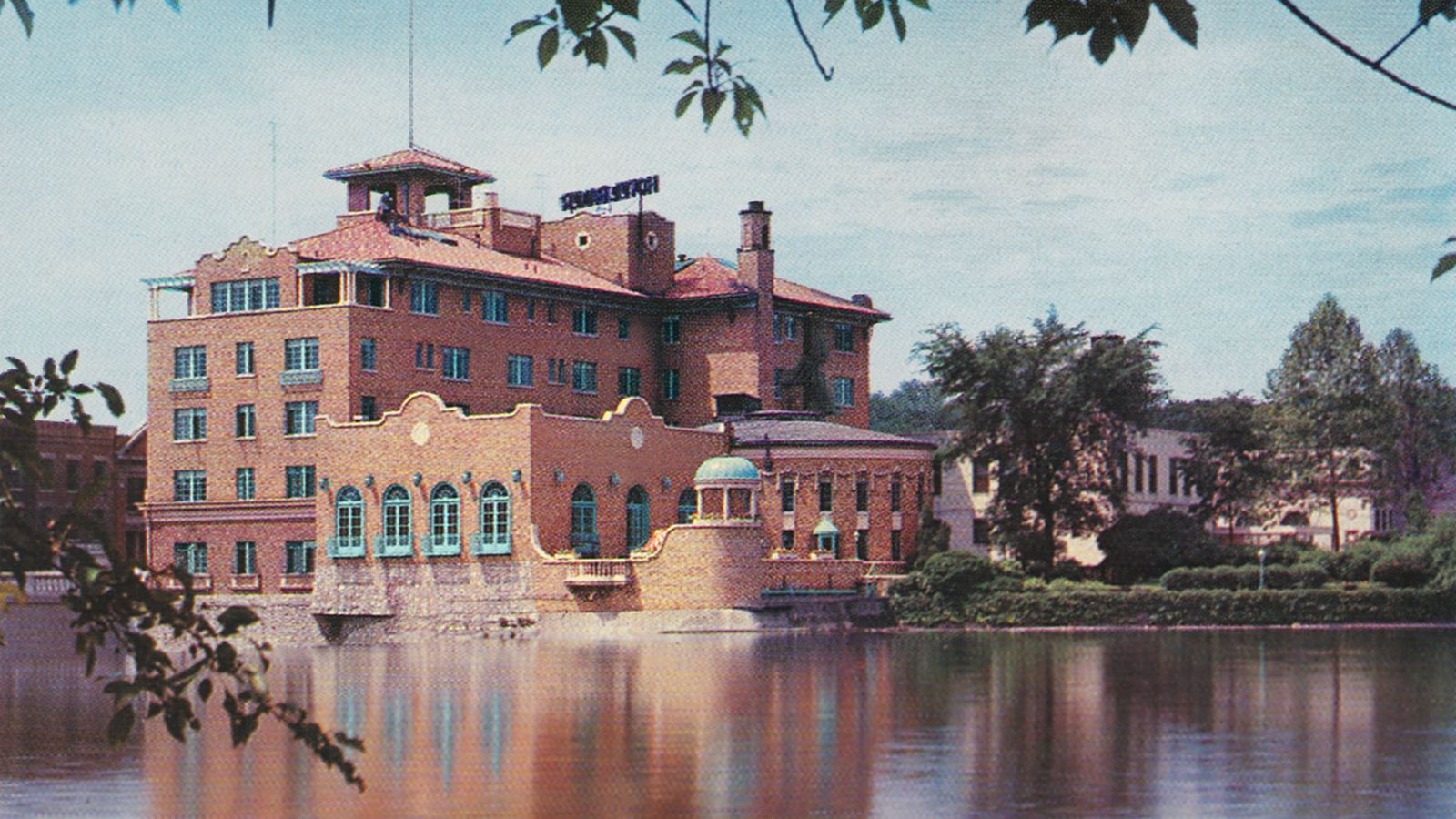 Vintage postcard view of Hotel Baker on the Fox River in downtown St. Charles, Illinois