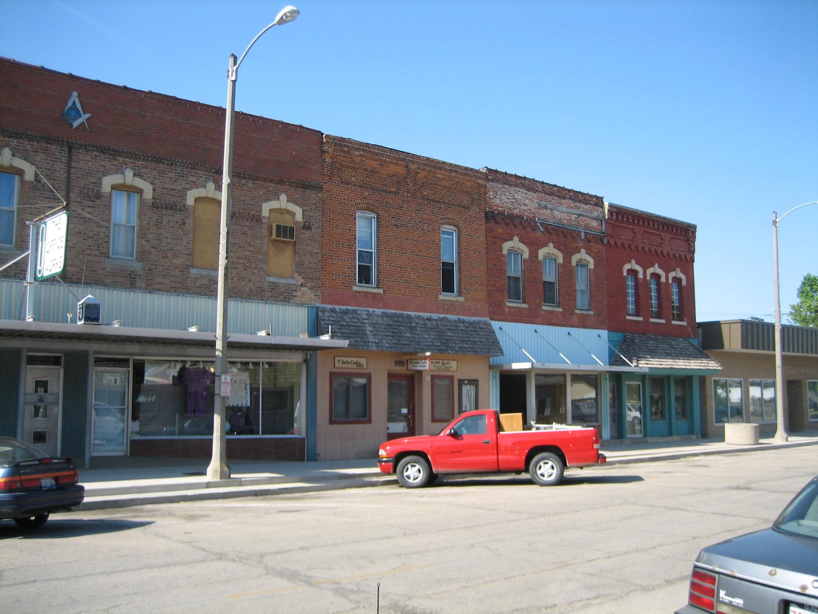 Brick storefronts along Main Street in downtown Plano, Illinois