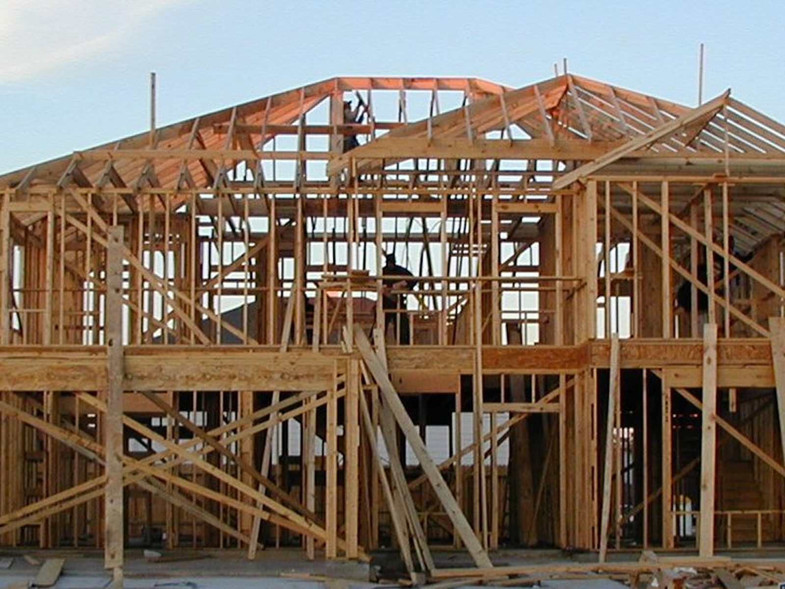 A wood-framed house under construction