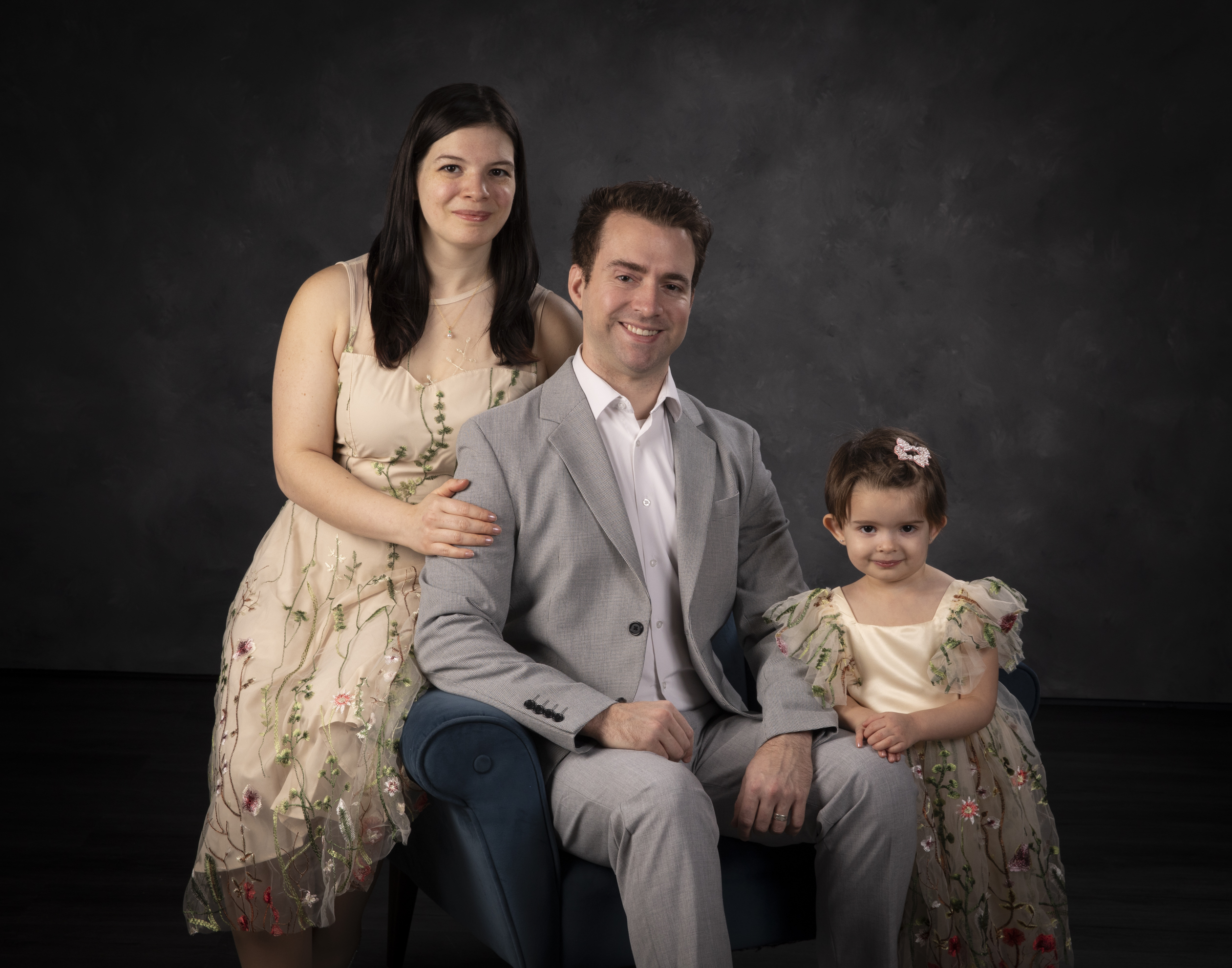 A family of four photographed in the Mallory Portraits studio
