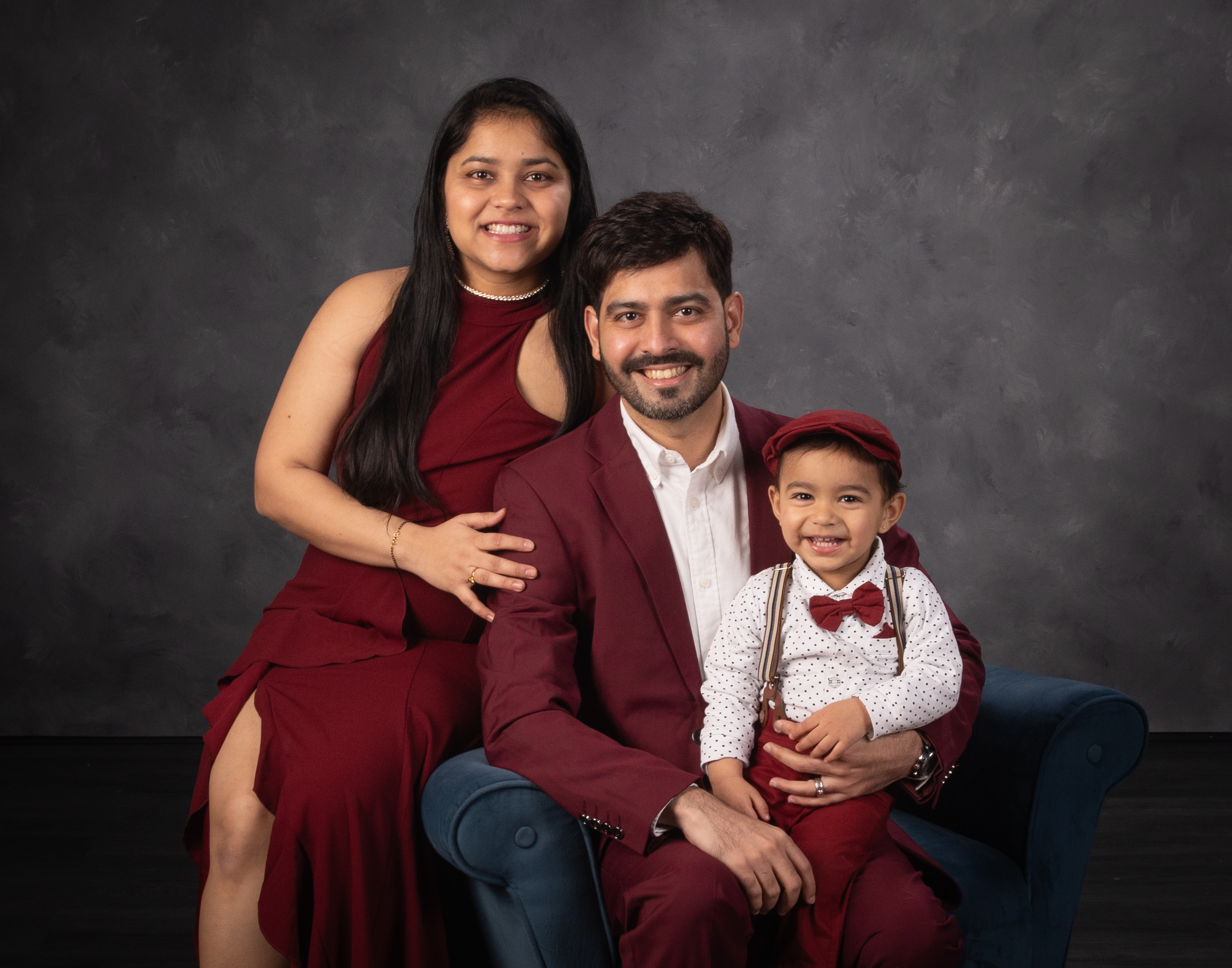 A family of three photographed together