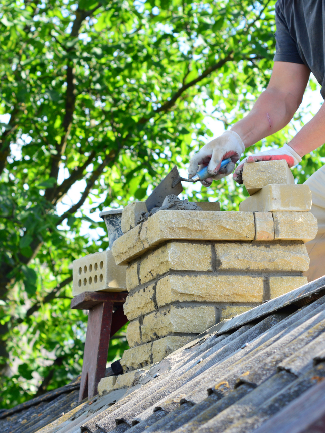 Chimney crown and cap repair with masonry repointing