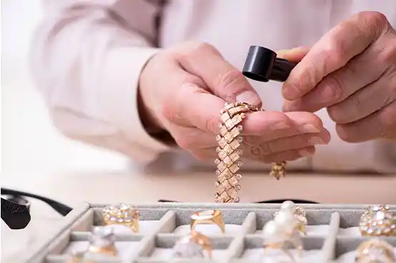 Goldsmith Checking Jewellery