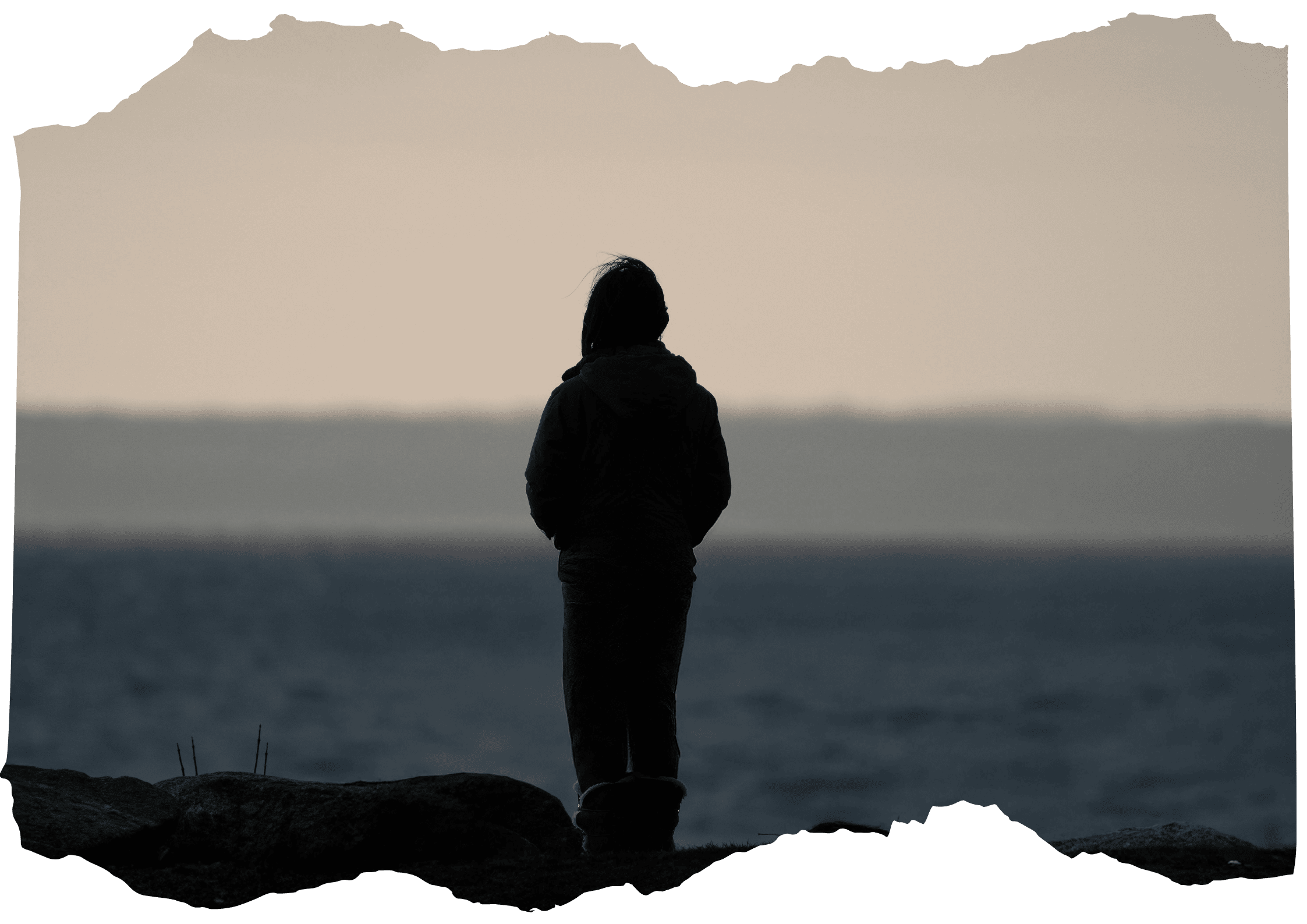 Person standing alone by the water at dusk, reflecting during burnout as body signals it can no longer keep pushing Person standing alone by the water at dusk, reflecting during burnout as body signals it can no longer keep pushing
