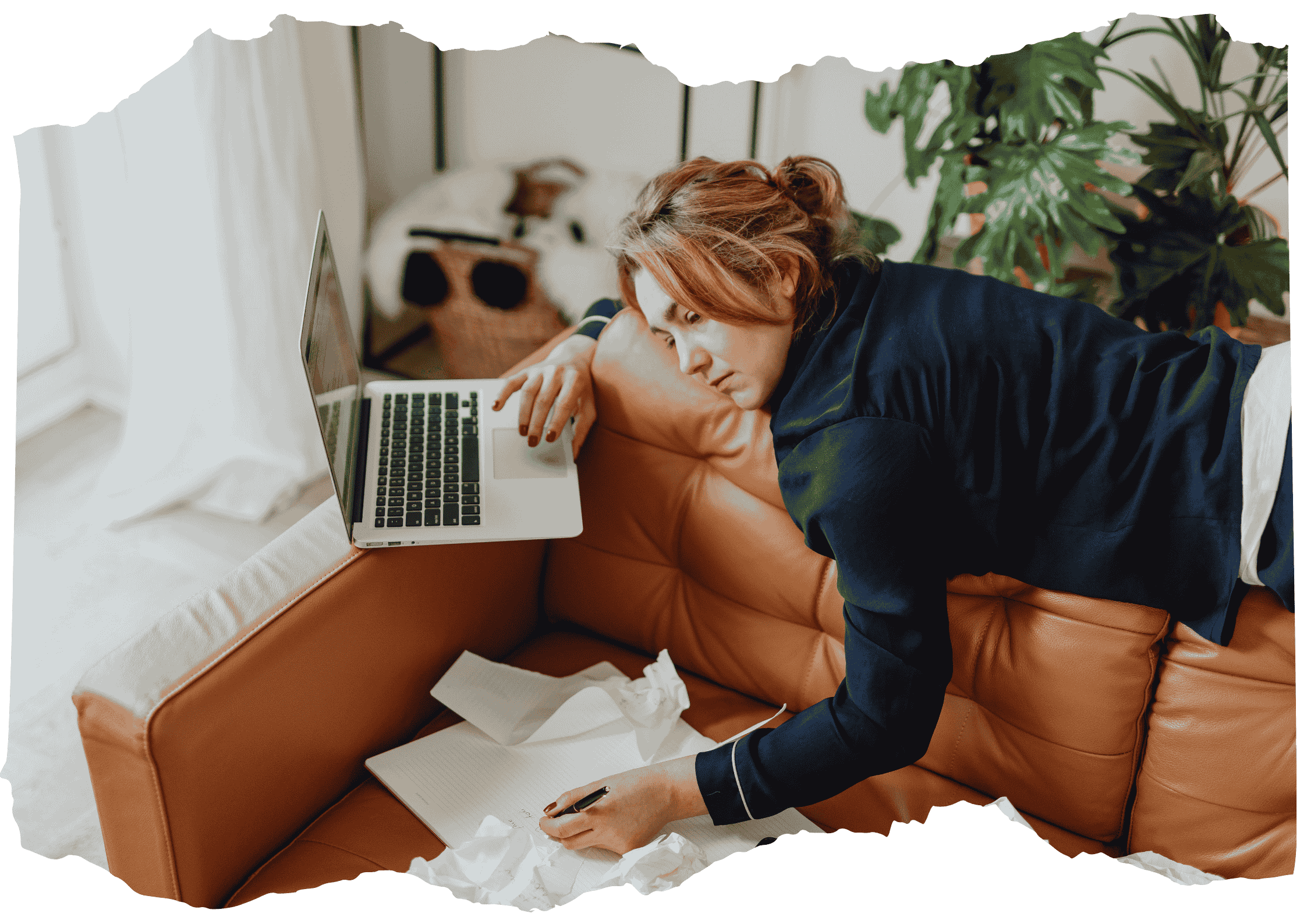 Exhausted woman lying on couch working on laptop, showing burnout and body resisting ongoing stress Exhausted woman lying on couch working on laptop, showing burnout and body resisting ongoing stress