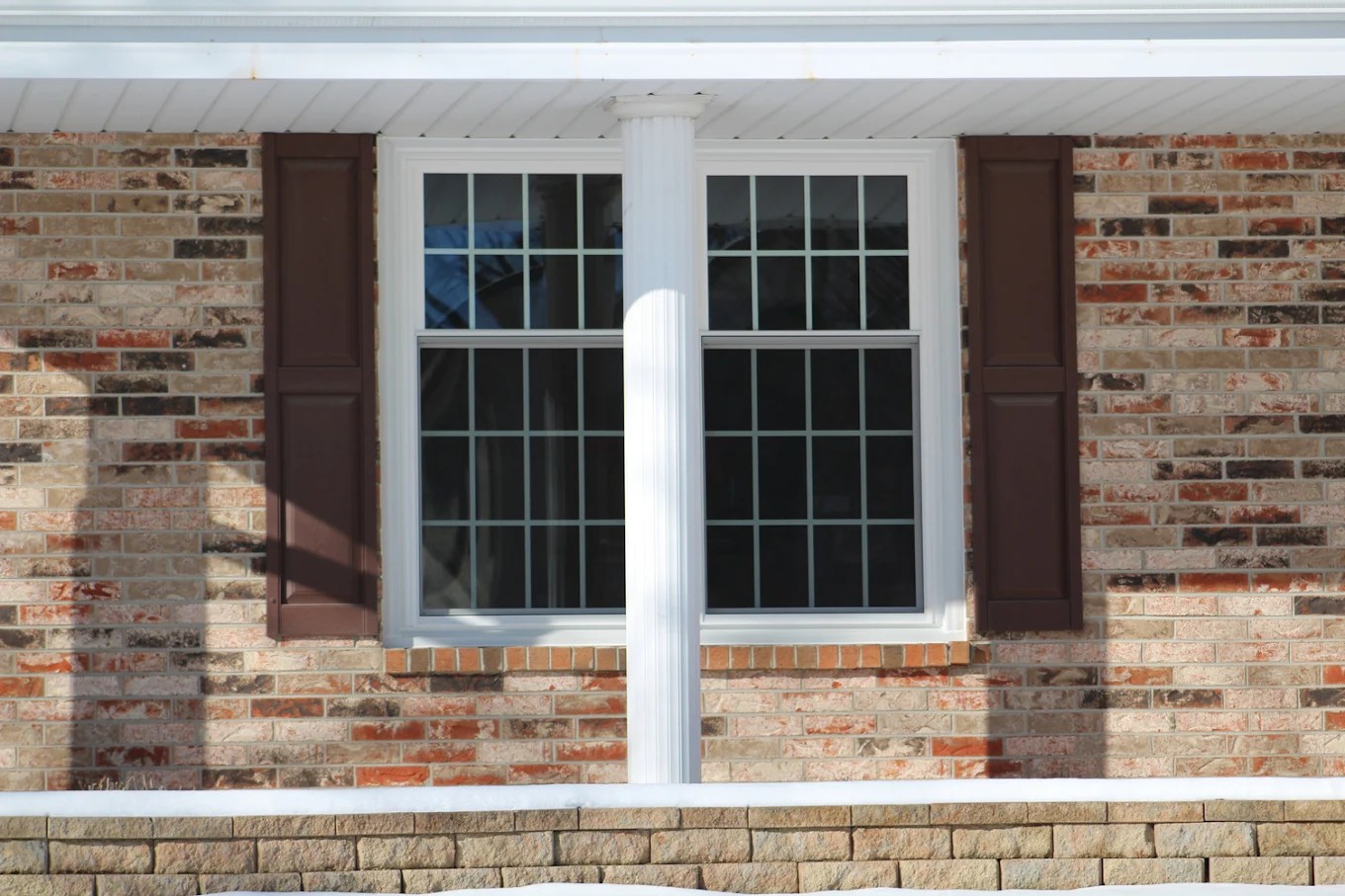 Exterior double window brick home