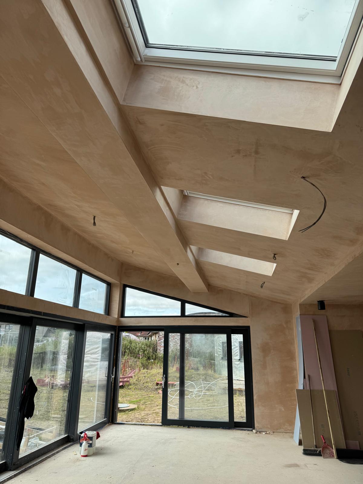 Full loft conversion plastering — beams and ceiling skimmed Linlithgow