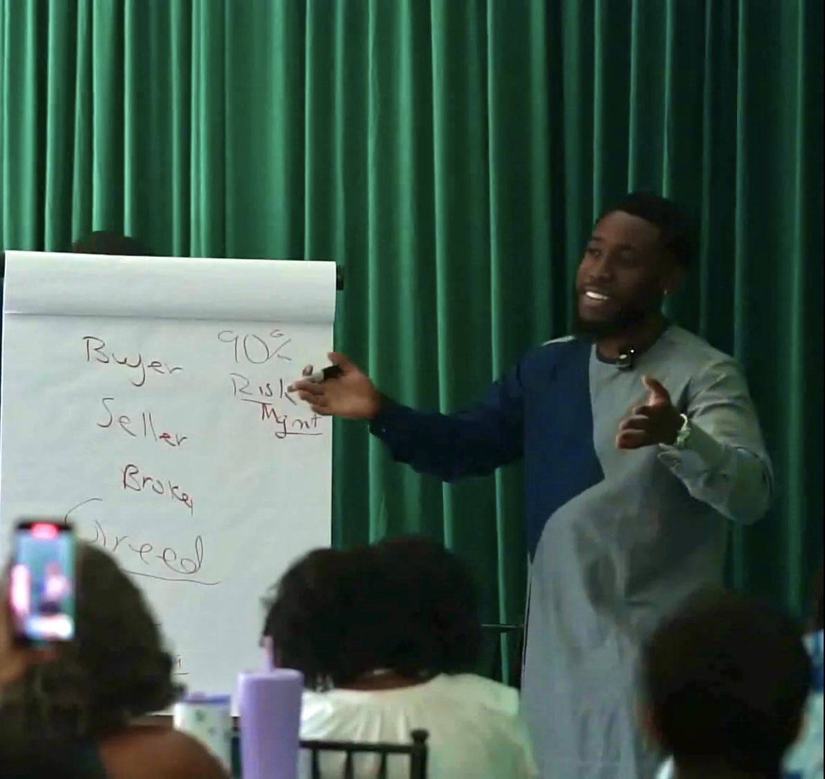 Coach Wasi Akin hosting the Wise & Wealthy Webinar