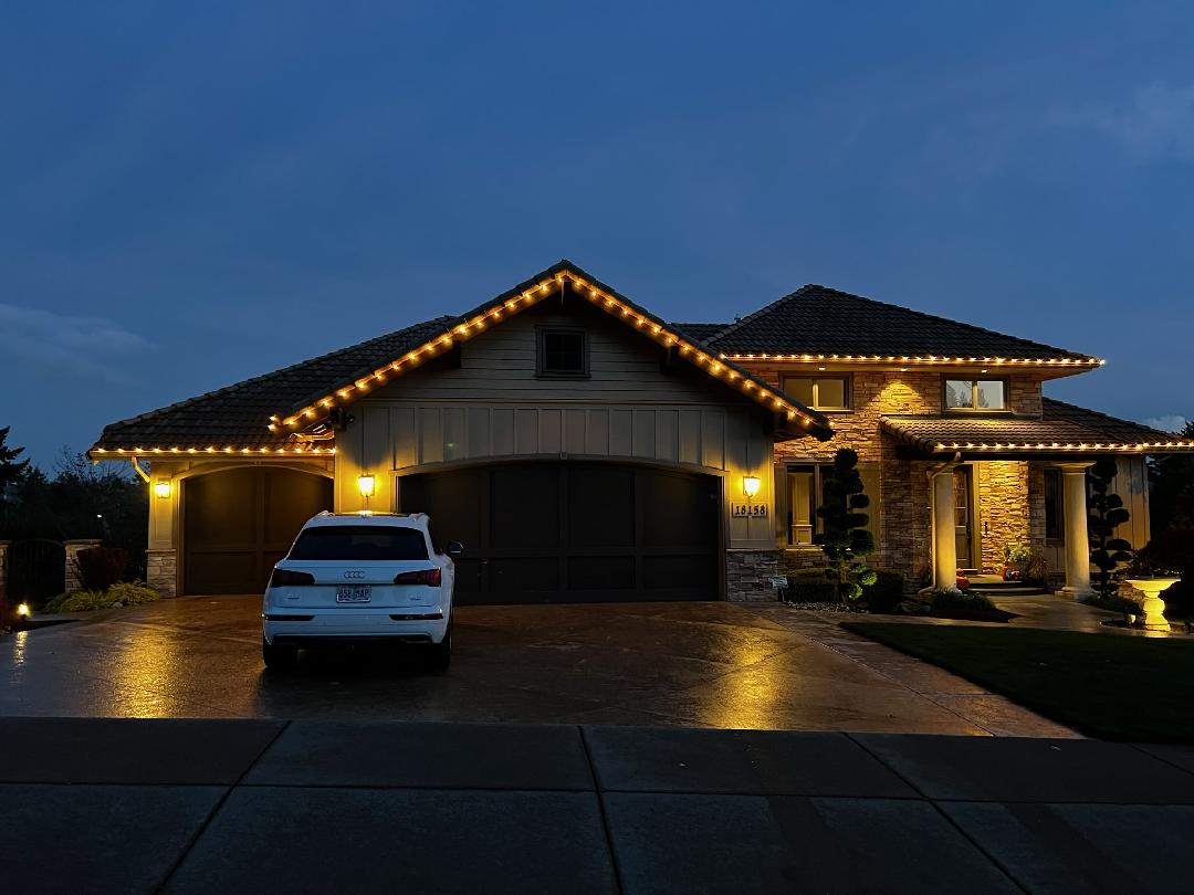 Beaverton neighborhood home with professionally installed holiday lights