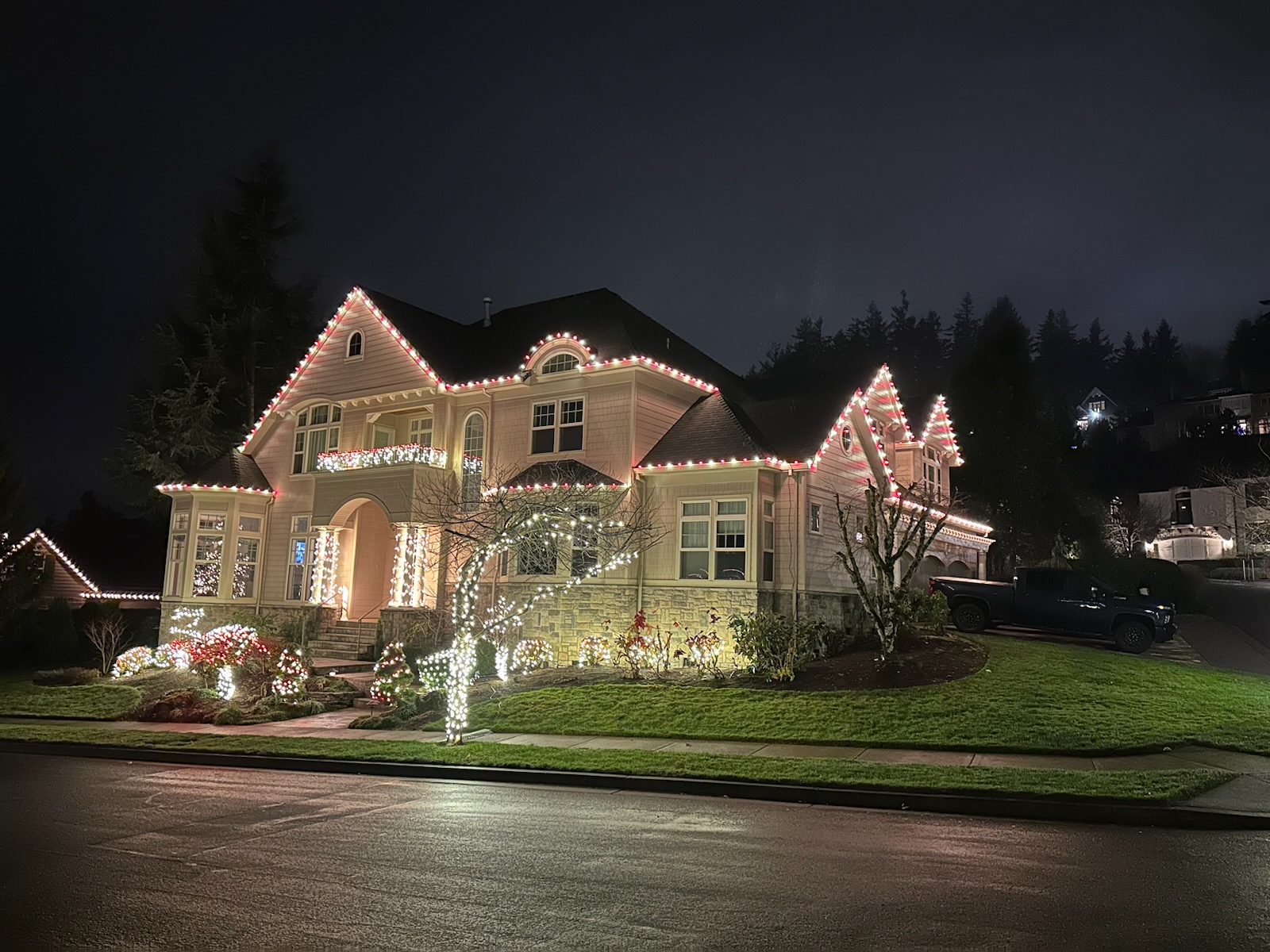 Custom Christmas light installation on two-story home in Lake Oswego