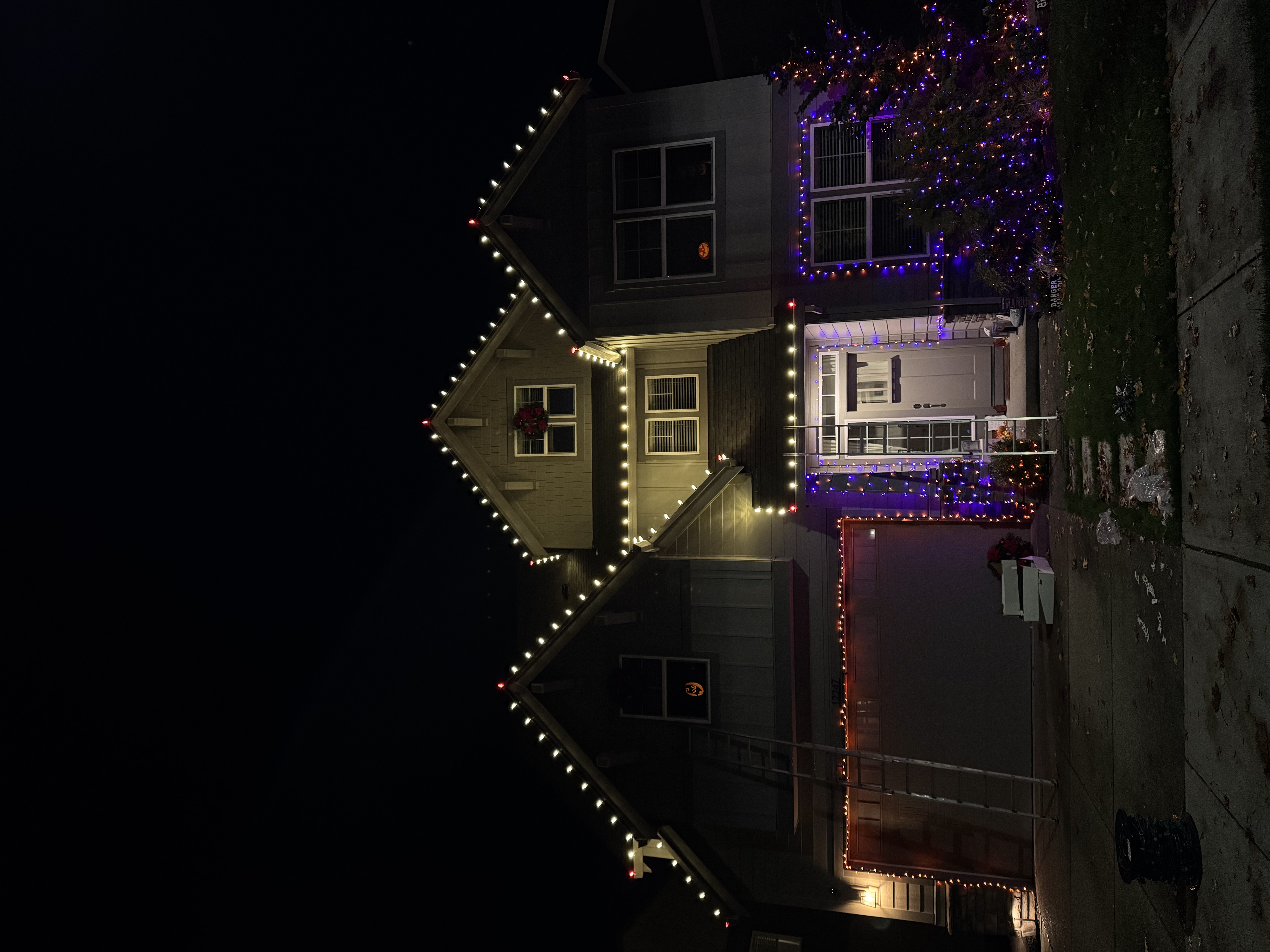 Warm white roofline Christmas lights installed by Christmas light installers in Beaverton, OR