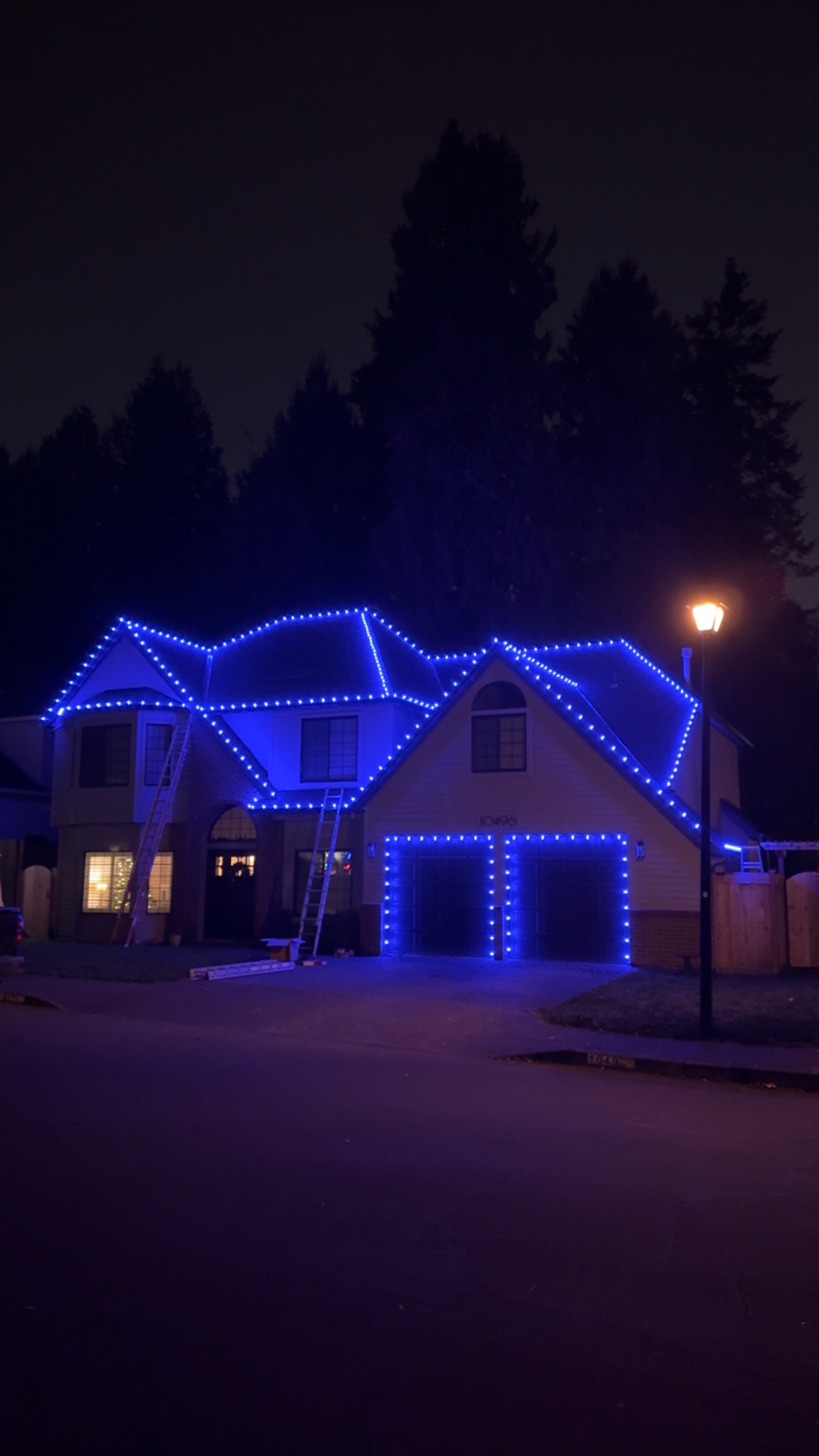 Custom designed holiday lighting display on luxury Oregon home