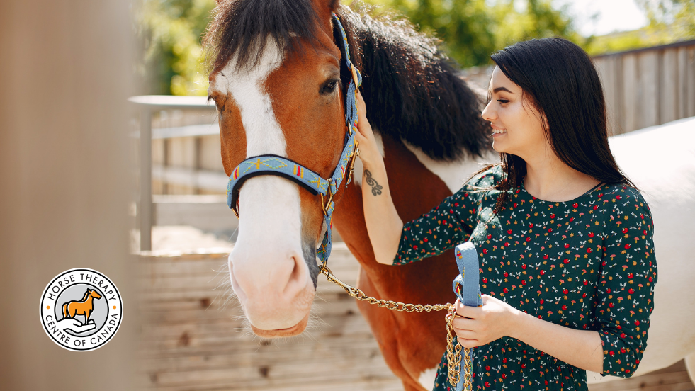 Therapist walking with a horse as part of mental health therapy practice