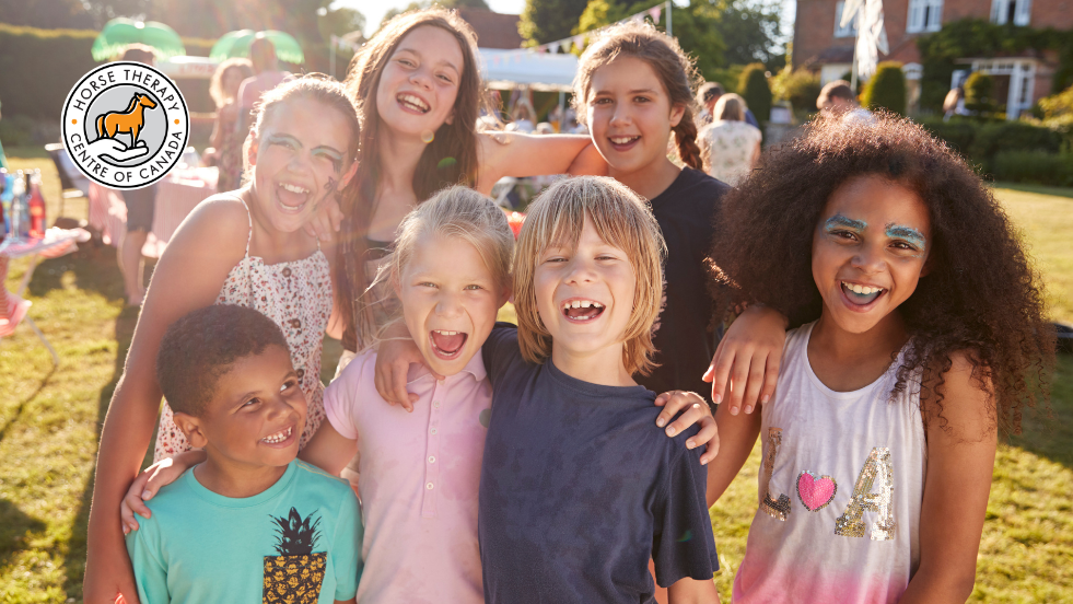 Happy kids participating in activities at a therapy camp Happy kids participating in activities at a therapy camp