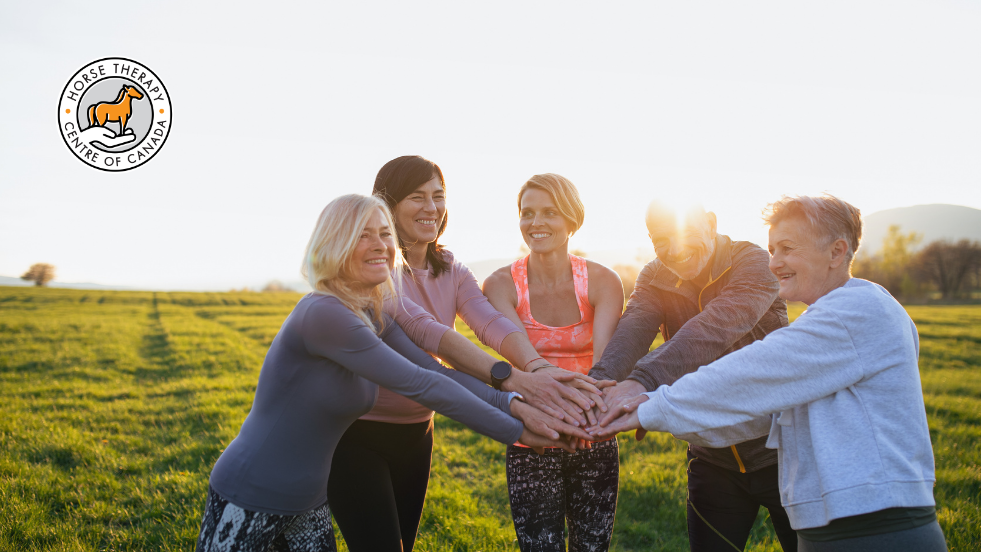 People sitting together in a circle creating healing connections in a calm setting