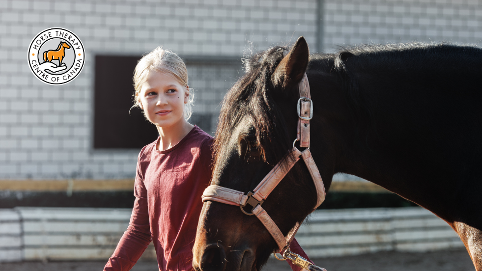 Woman standing beside a horse illustrating horses and healing