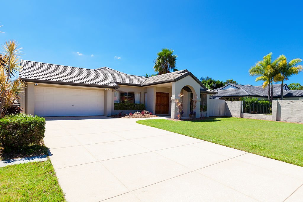A house with a concrete driveway