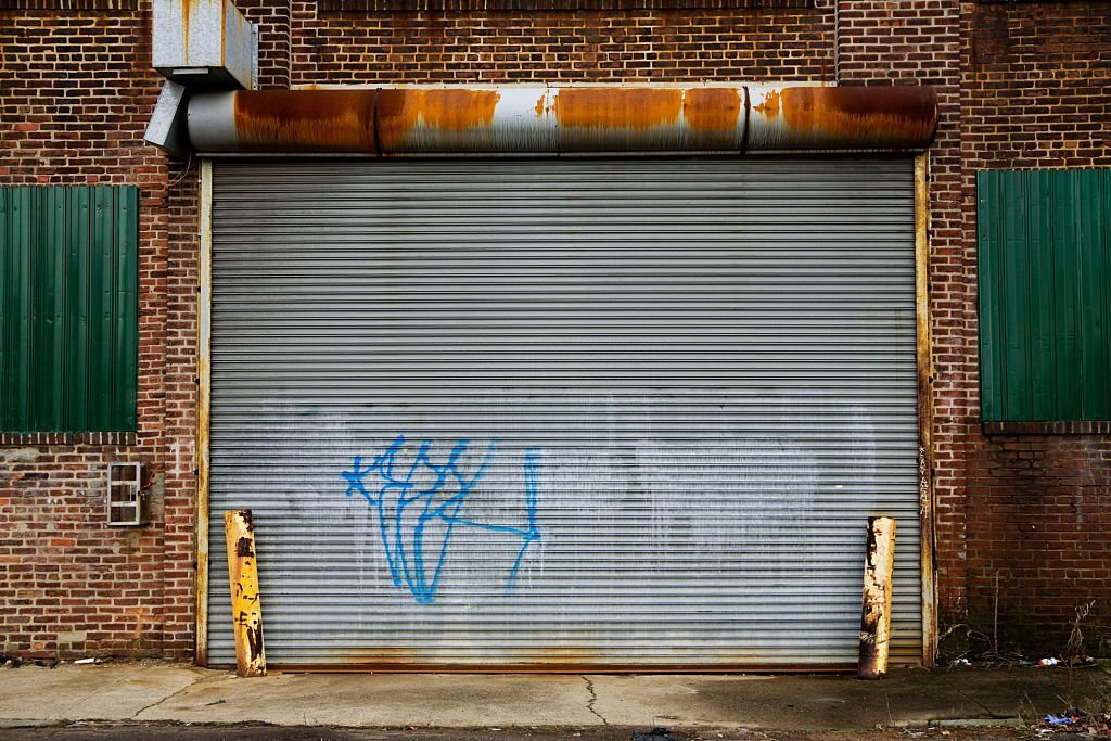 A worn overhead garage door