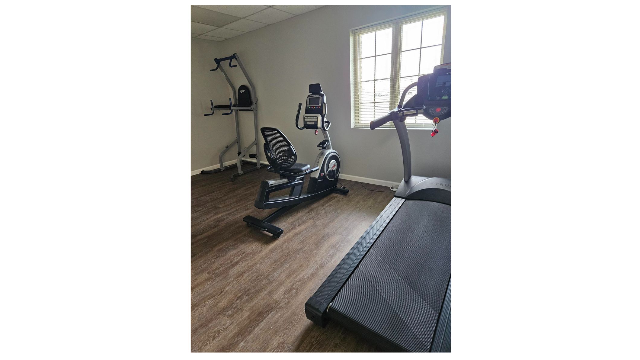 Fitness room at Advanced Anti-Aging Center of Excellence with treadmill and exercise bike