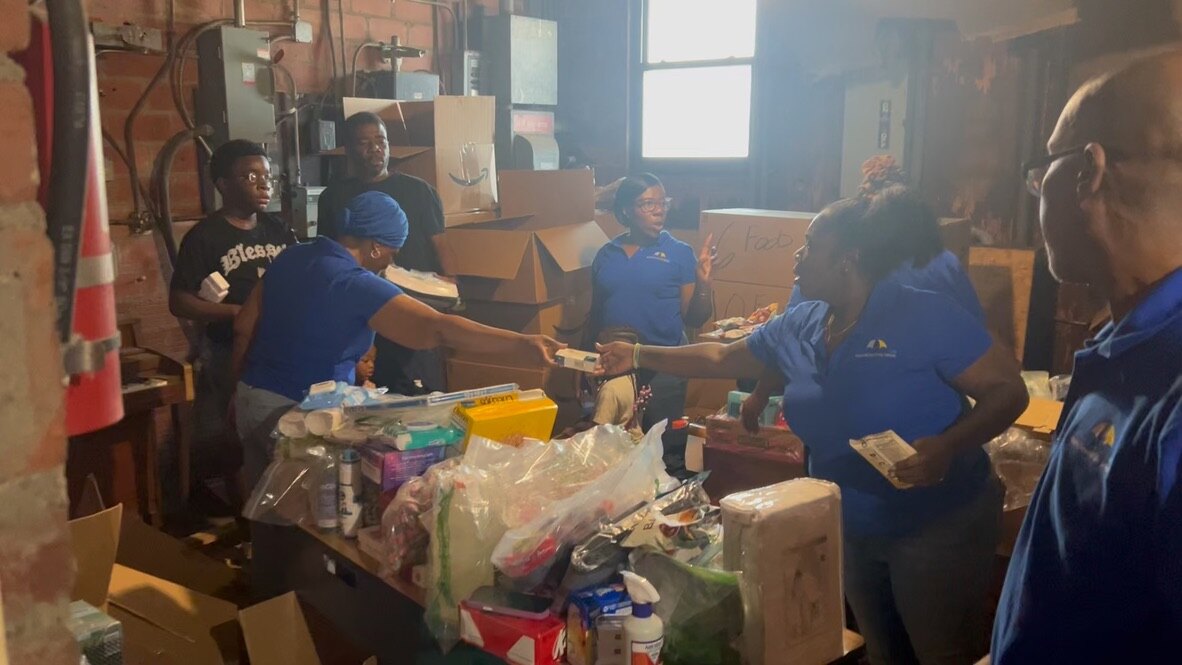 HEALS Network volunteers handing out supplies in Jacksonville