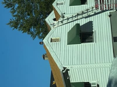 contractors working on new roof restoration