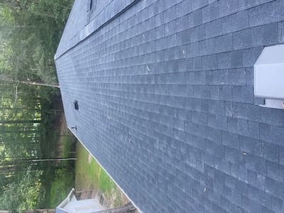 Renovated roof with newly installed shingles