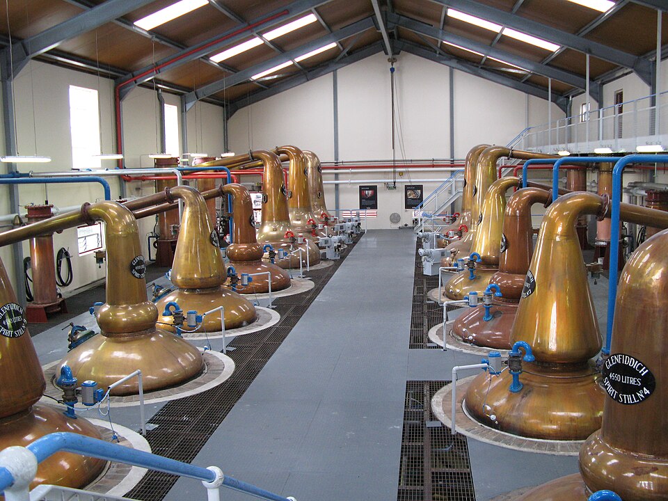 Copper pot stills at Glenfiddich Distillery — one of Speyside's flagship producers, still family-owned since 1887. Copper pot stills at Glenfiddich Distillery — one of Speyside's flagship producers, still family-owned since 1887.