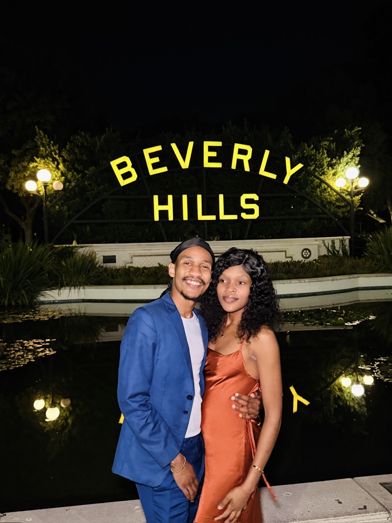 Munyaradzi Dongo and His wife Nyashadzashe Dongo at the Beverly Hills Sign aster the dinner of their night Munyaradzi Dongo and His wife Nyashadzashe Dongo at the Beverly Hills Sign aster the dinner of their night