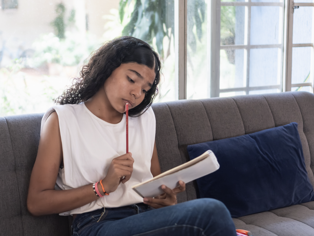 teenager trying to study teenager trying to study