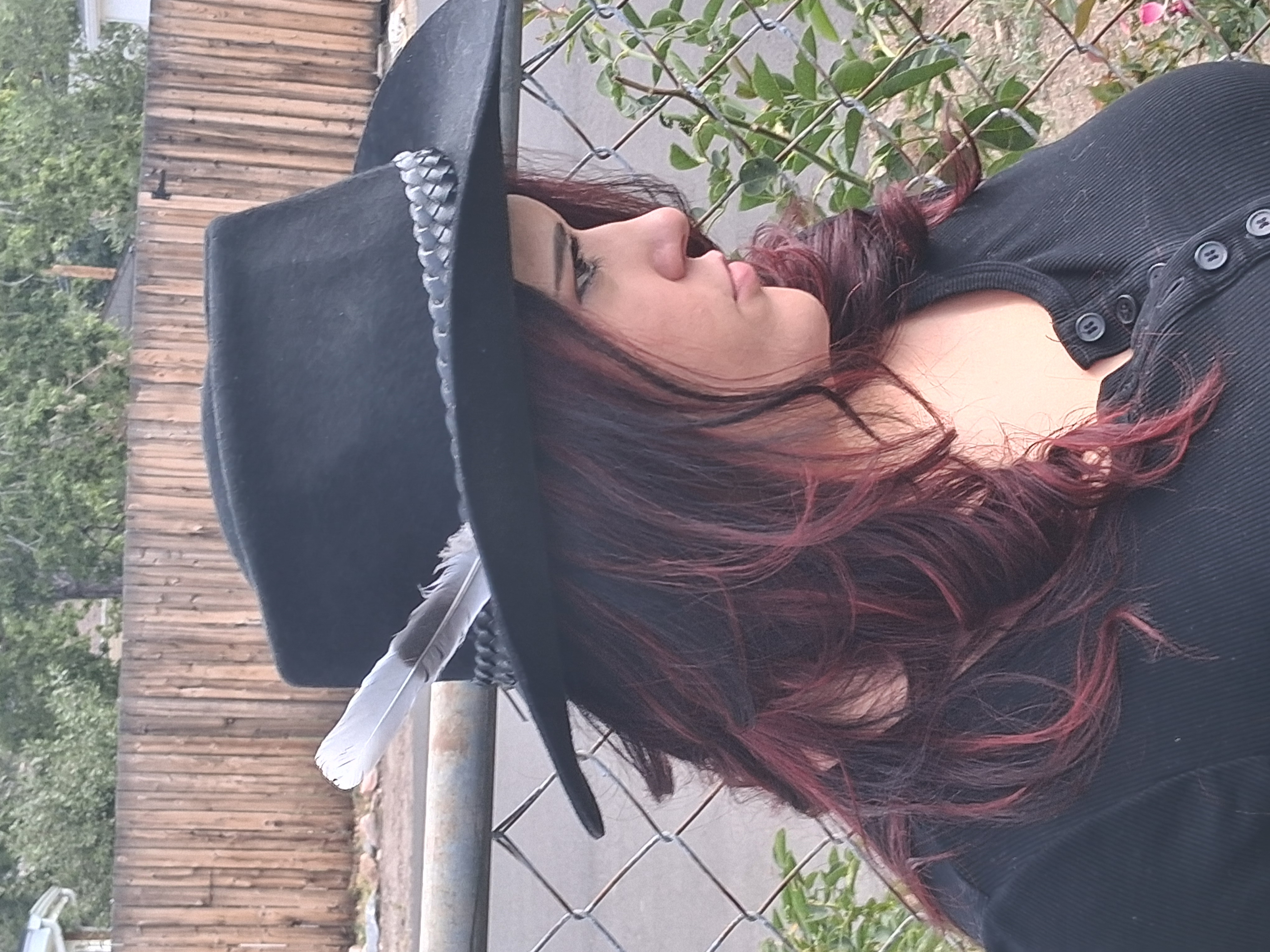 Custom black felt hat with feather trim, by Ace of Spadez