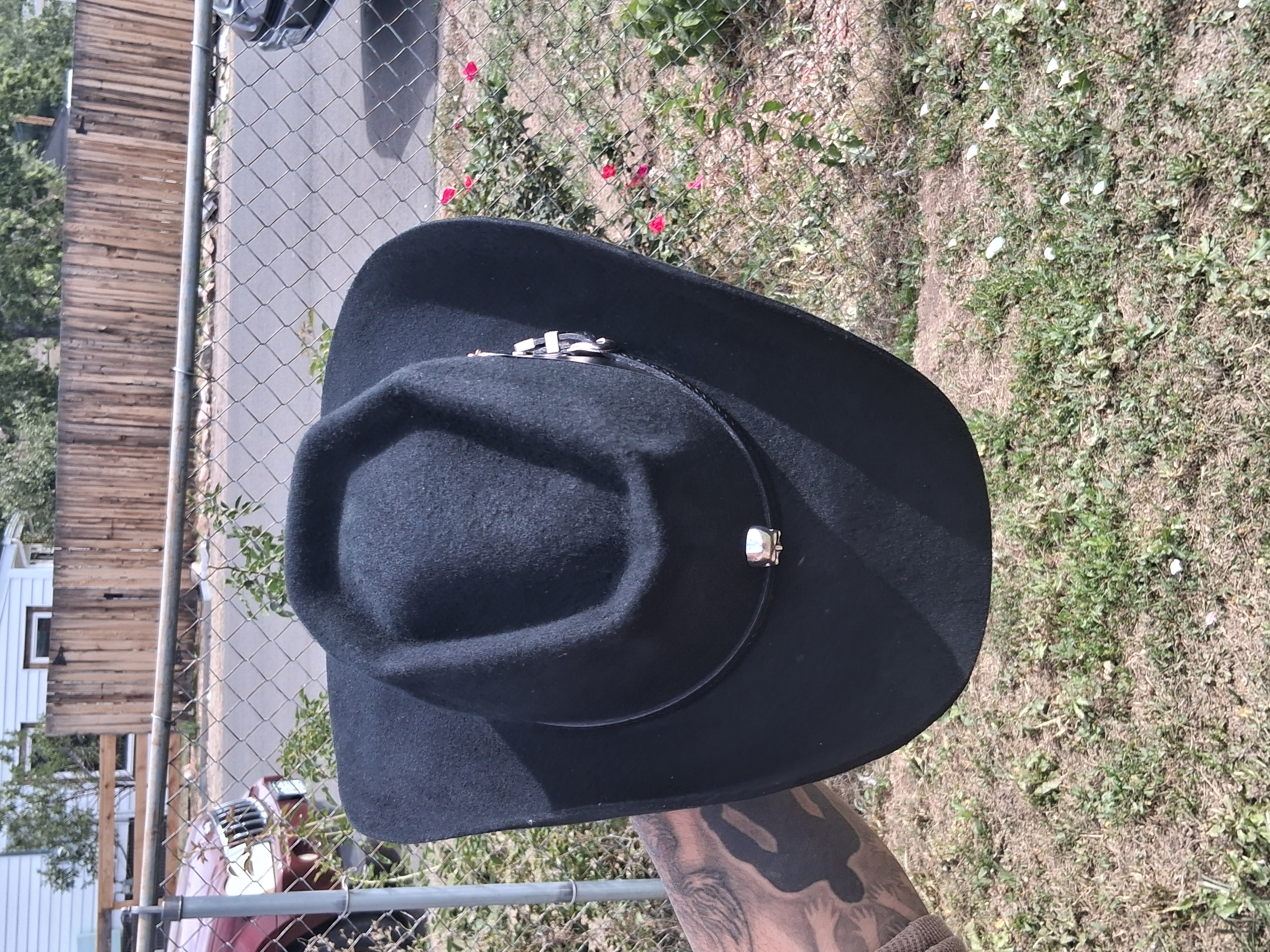 Custom black felt hat with silver concho band, by Ace of Spadez