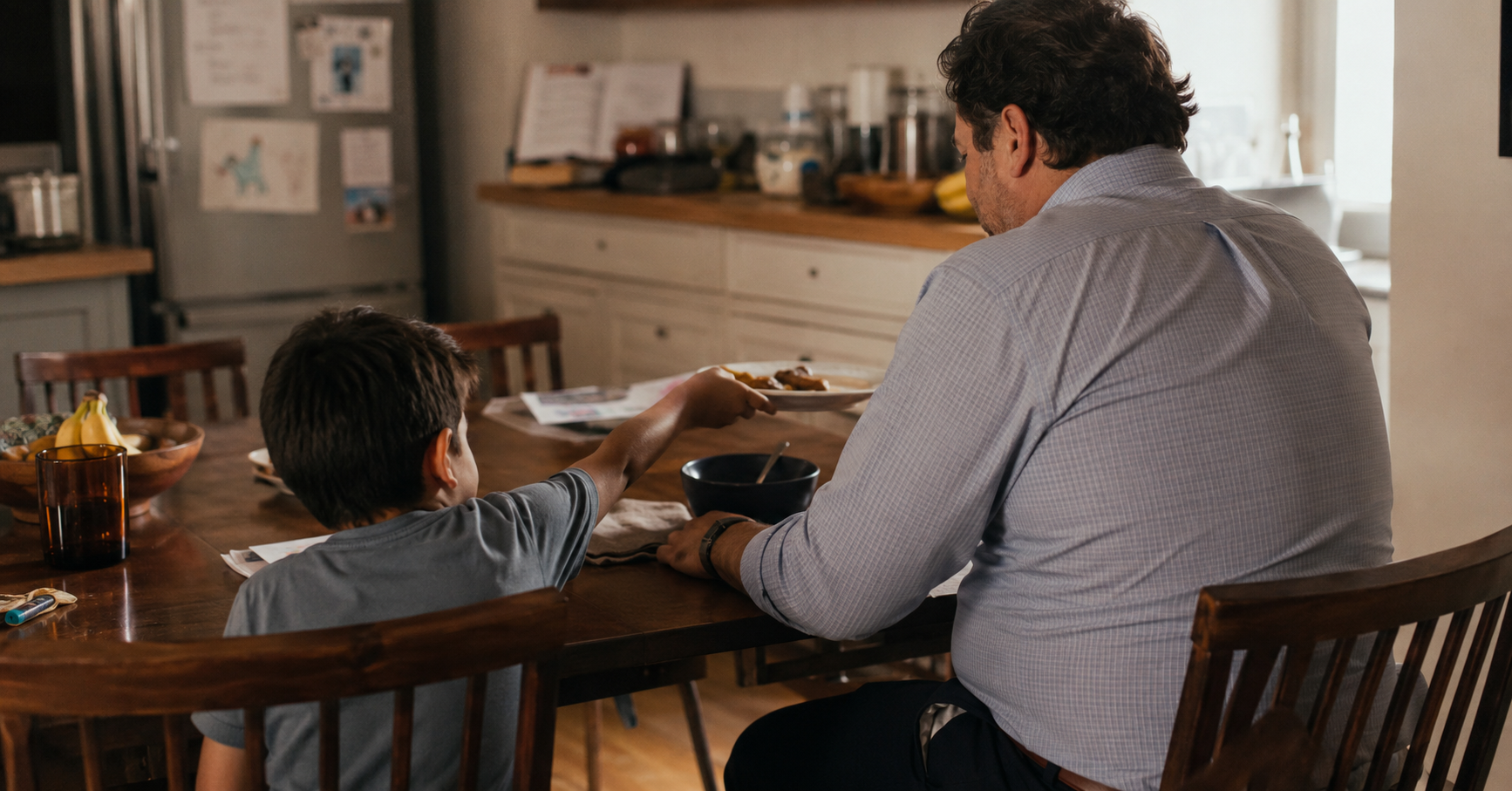 father and daughter sharing meal together after work