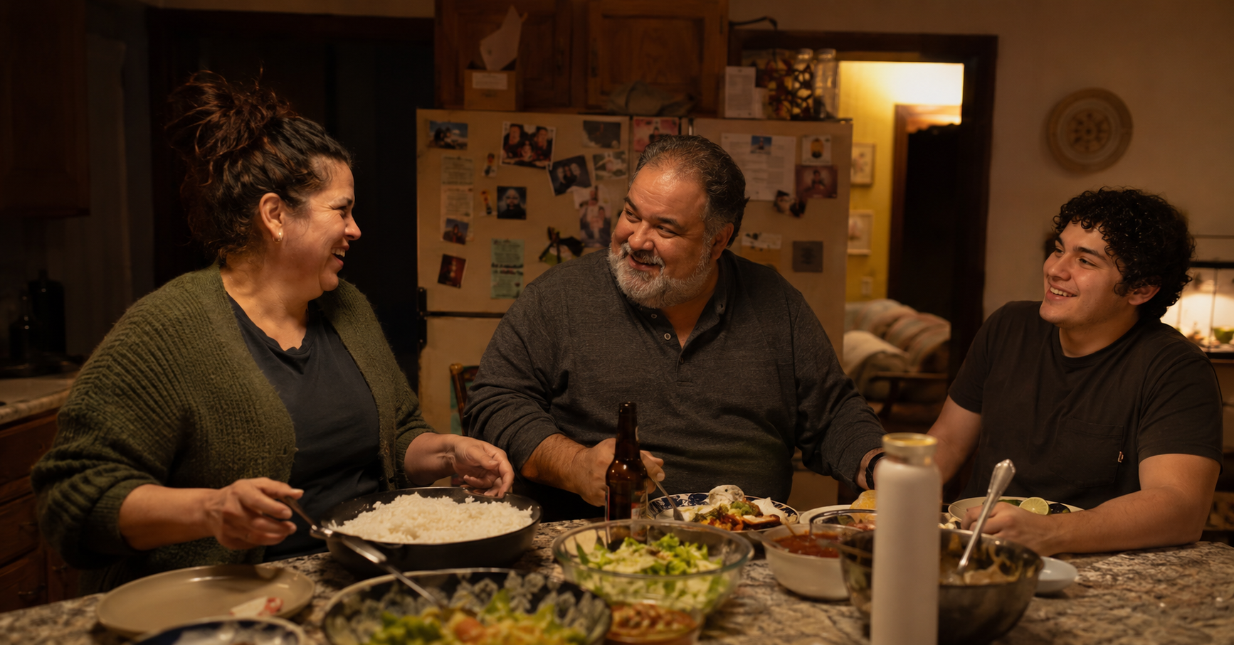 family preparing a meal together in kitchen after making healthier daily habits family preparing a meal together in kitchen after making healthier daily habits