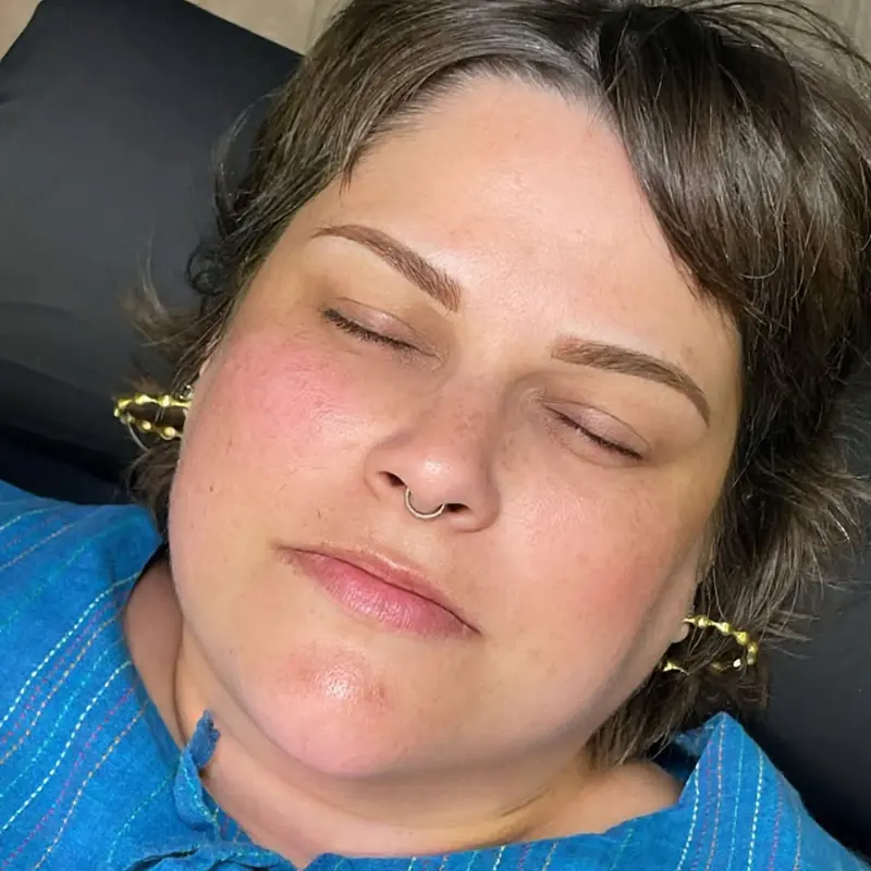 Client with evenly balanced brows mapped to her features
