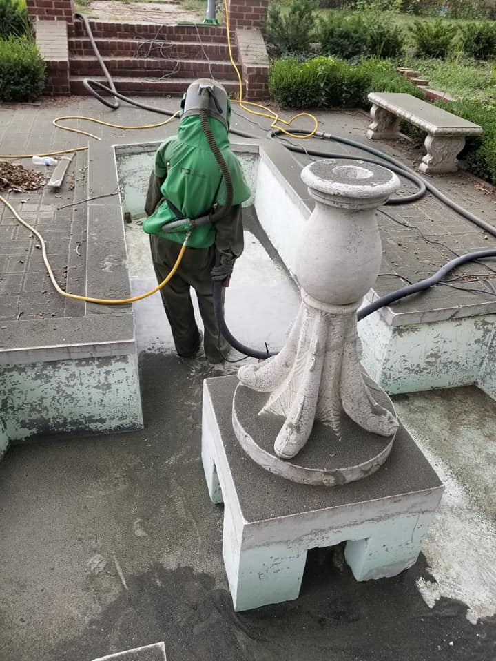 Concrete and stone surface preparation — pool restoration work