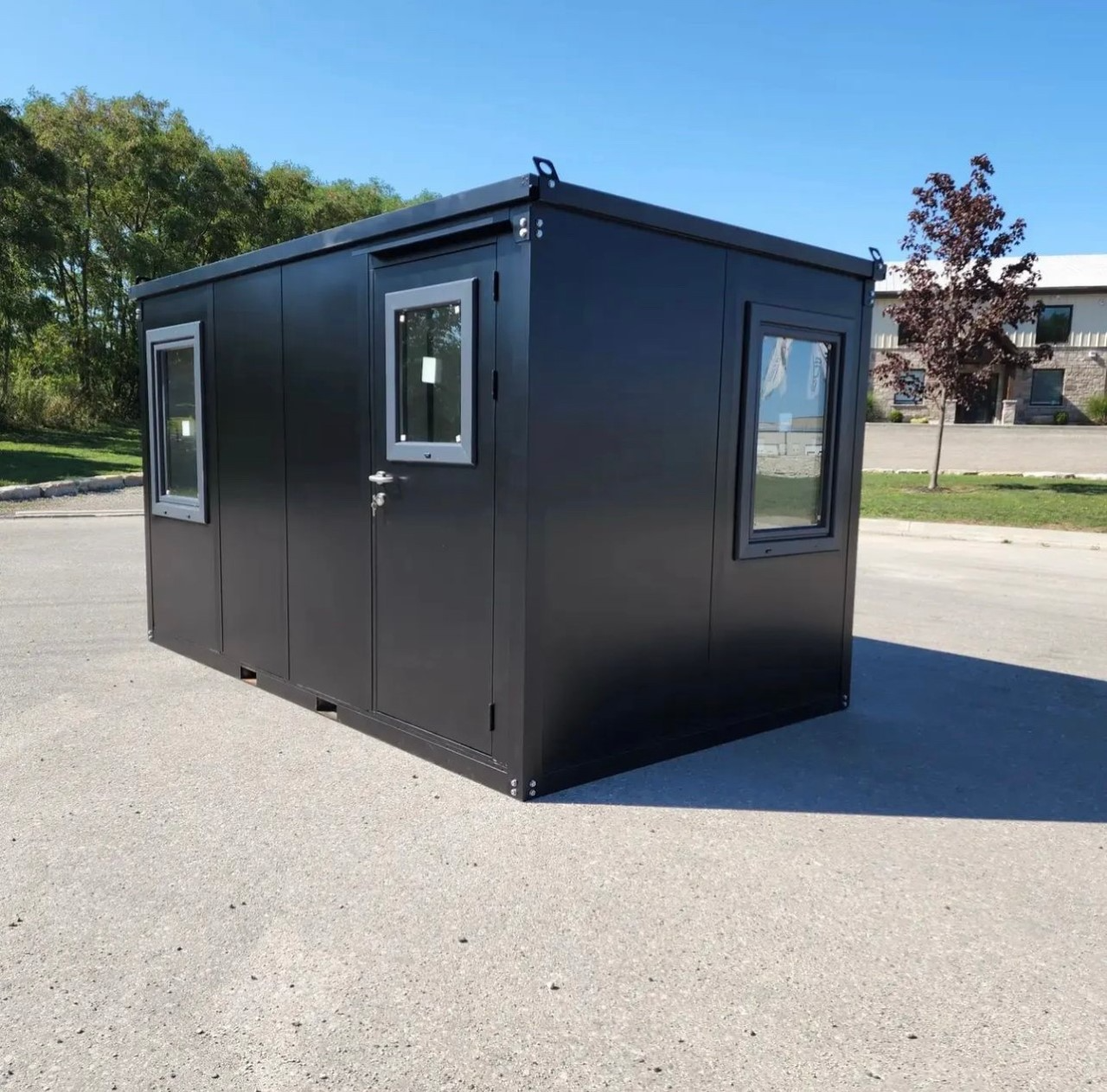 Longpodz 7x7 office pod with entry door and windows, outdoors