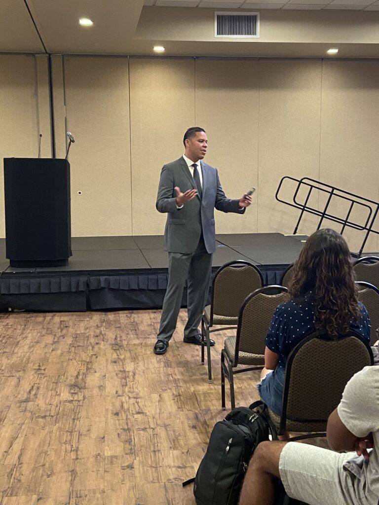 Dr. Jairo Borja speaking to an audience