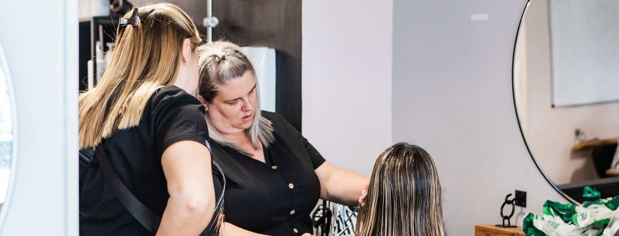 Students training on the salon floor at TNB Skills Training in Folkestone