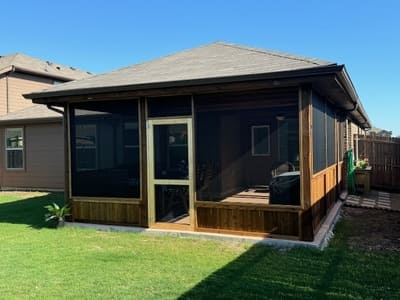 Custom-built screened porch with a durable wooden frame