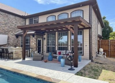 Sturdy wooden pergola over a patio