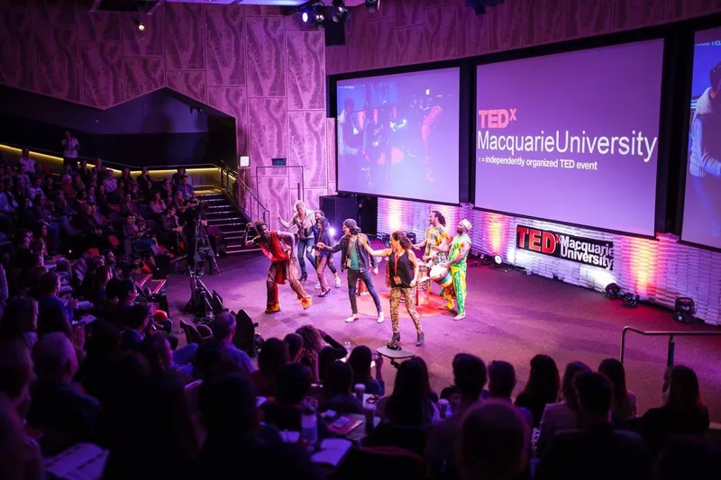 African Beat dancers performing on the TEDx stage at Macquarie University
