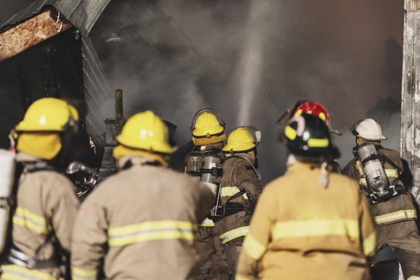  First responder practicing trauma-informed yoga to reduce stress and reconnect with the body