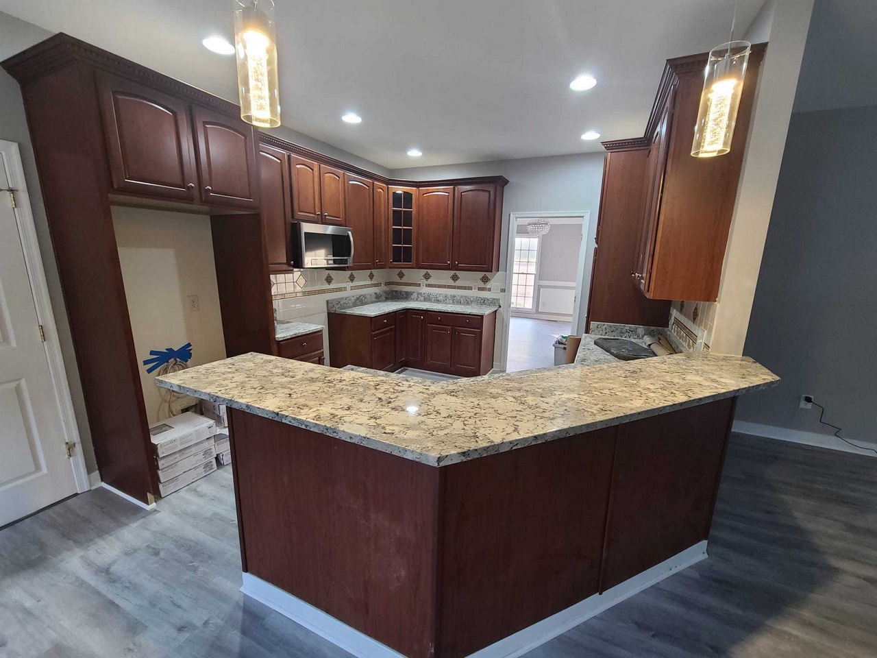 Cabinet refinishing work updating existing kitchen cabinetry