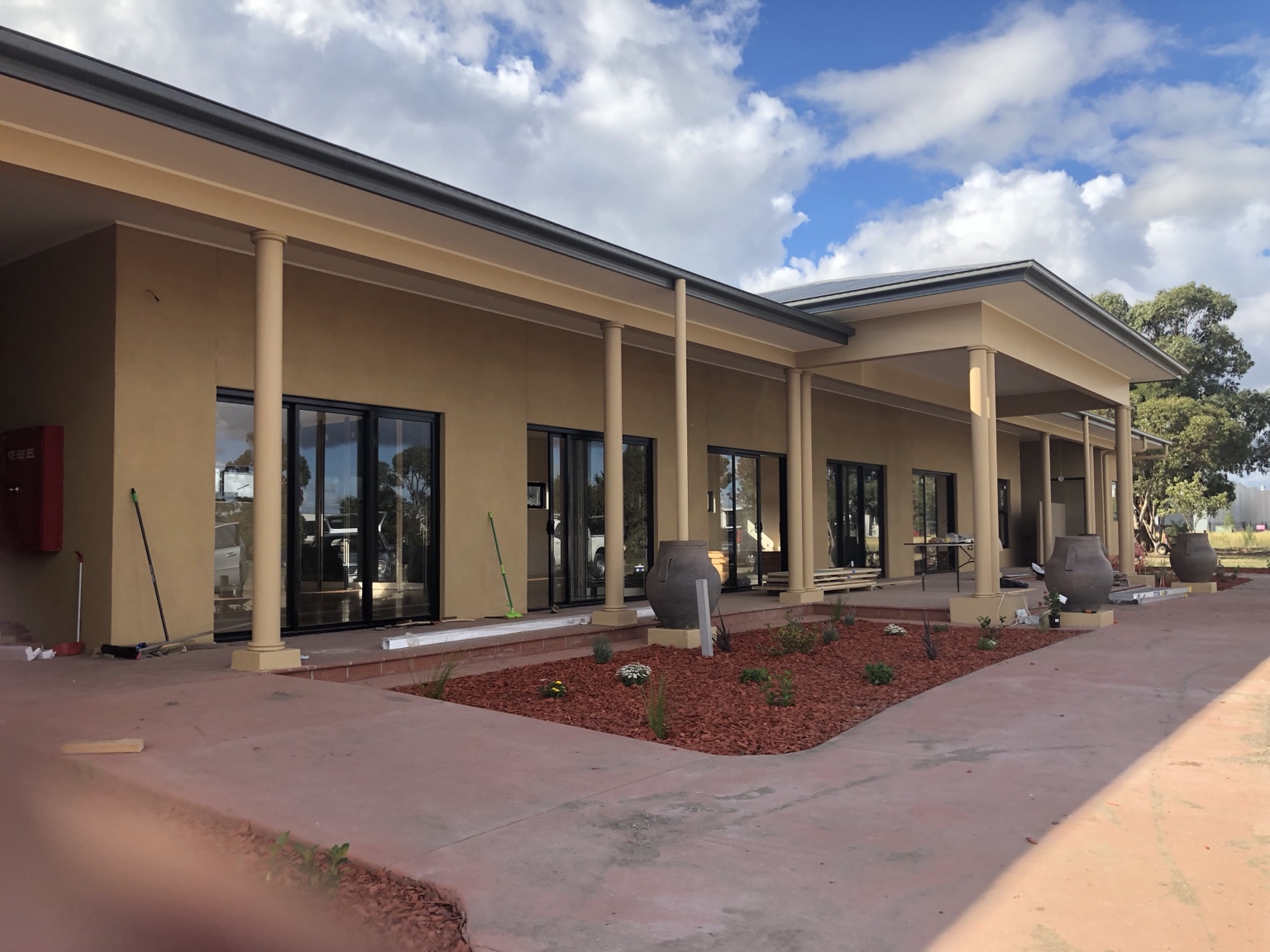 Religious building and landscaped entry — related UC Build project example