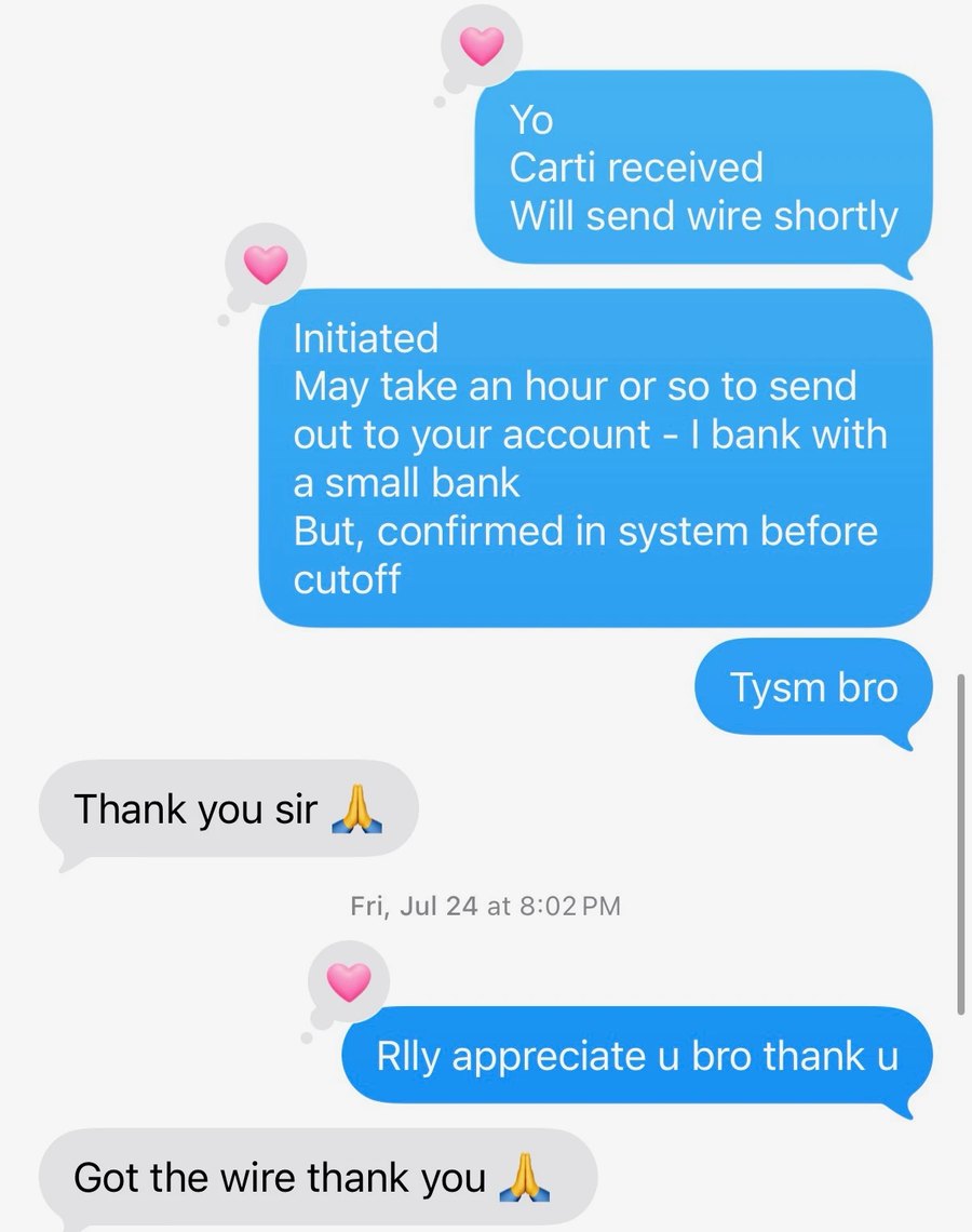 Text message thread confirming a completed wire payment to a seller